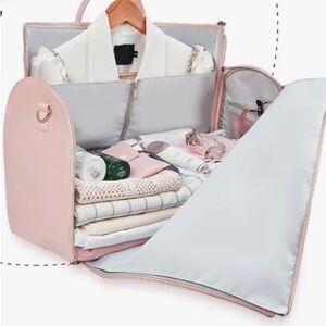 Carry on DuffleTravel Bag that opens up and hangs like a garment bag.